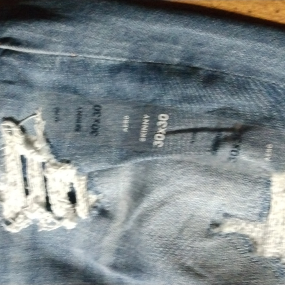 Brand new! Aeropostale performance denim skinny jeans with with small rips